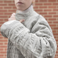 Recut Room Repurposed Hand Quilted Oyster Grey Linen Jacket with an all over hand quilted cross stitch in an off white embroidery thread