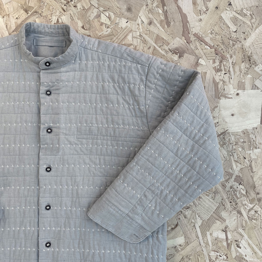 Recut Room Repurposed Hand Quilted Oyster Grey Linen Jacket with an all over hand quilted cross stitch in an off white embroidery thread