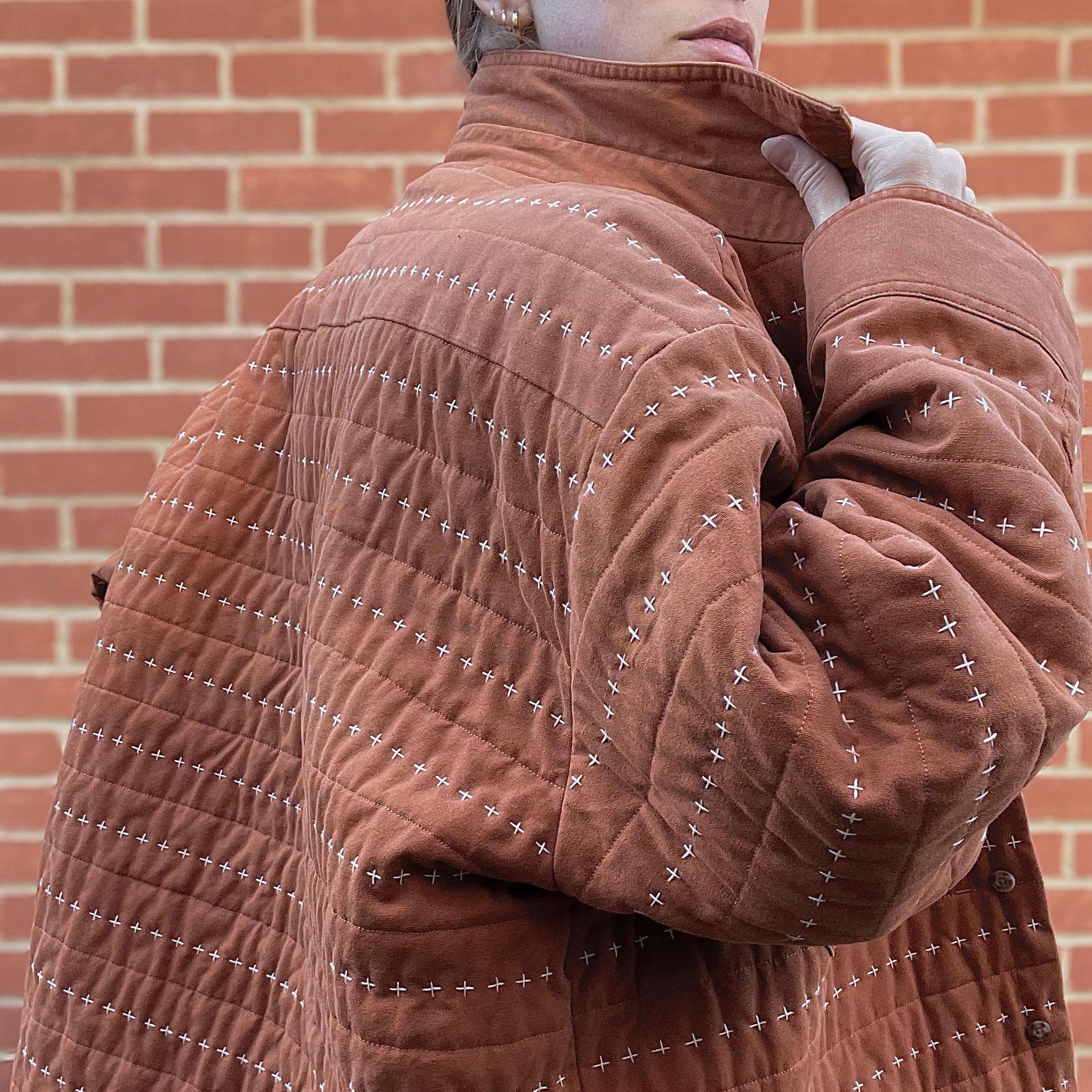 Recut Room Repurposed Hand Quilted Vintage Rust Canvas Jacket with contrast off white hand quilted cross stitch 