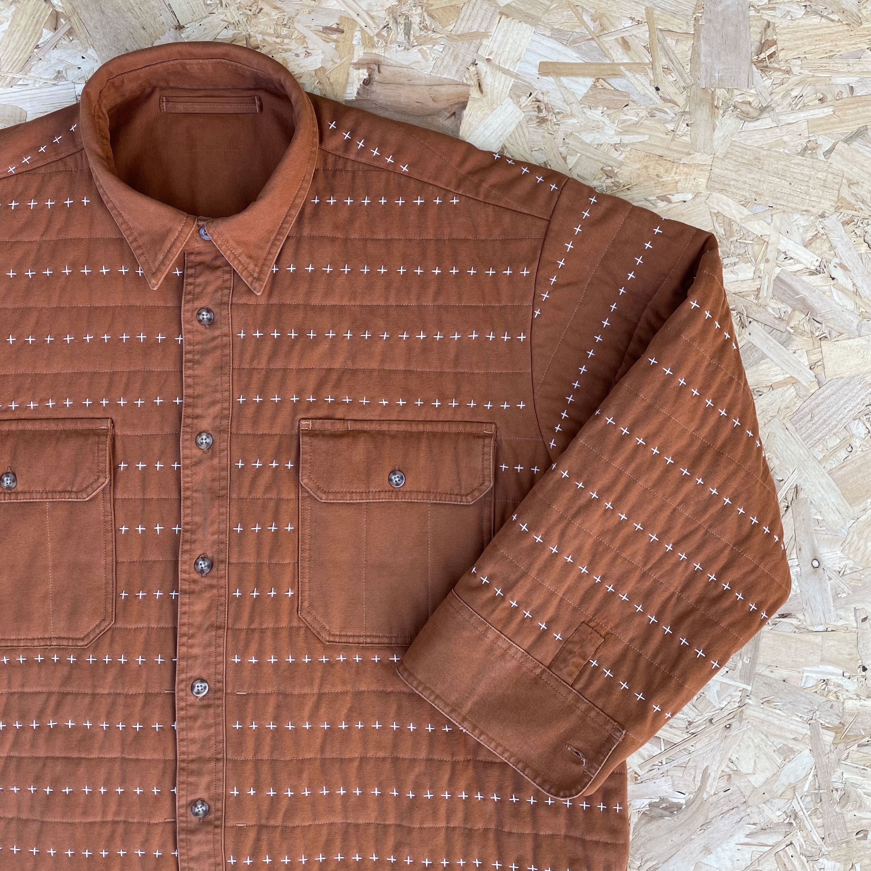Recut Room Repurposed Hand Quilted Vintage Rust Canvas Jacket with contrast off white hand quilted cross stitch 