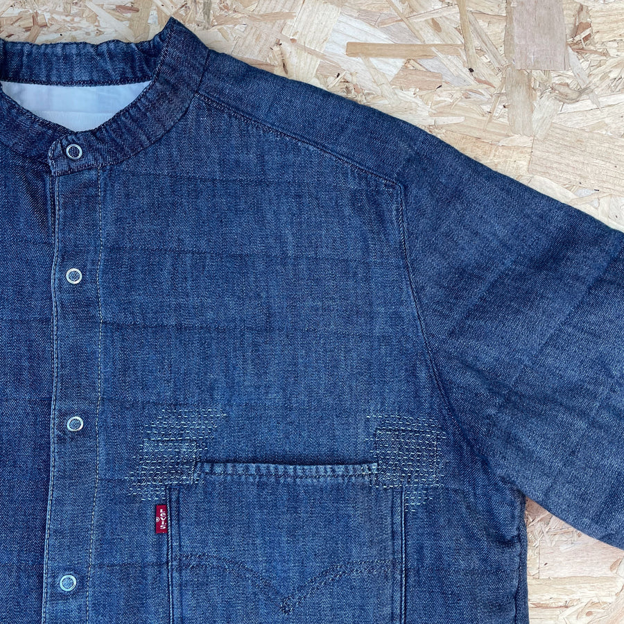 Recut Room Repurposed Levis Engineered jacket with visible mending in contrast off white stitch - pocket details